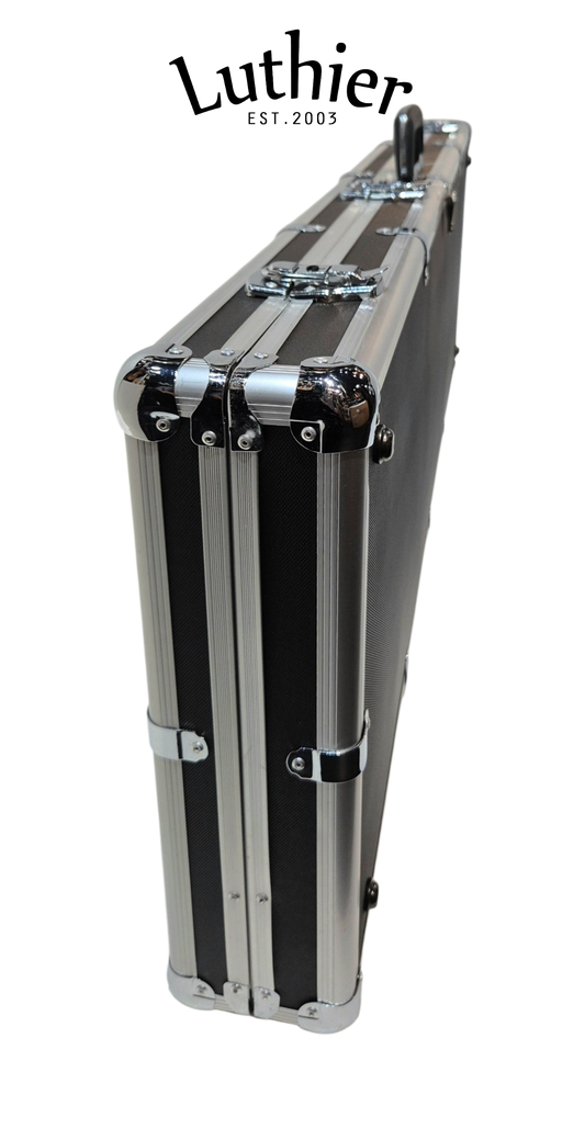 A black and silver aluminum with chrome metal corners protector hard case shown closed from an angled side view on a white background, with the Luthier brand logo printed above.