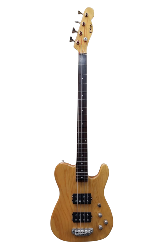 A premium swamp-ash wood four-string bass guitar with a dark fretboard, dual bars powerful pickups, and silver hardware, shown against a plain white background.