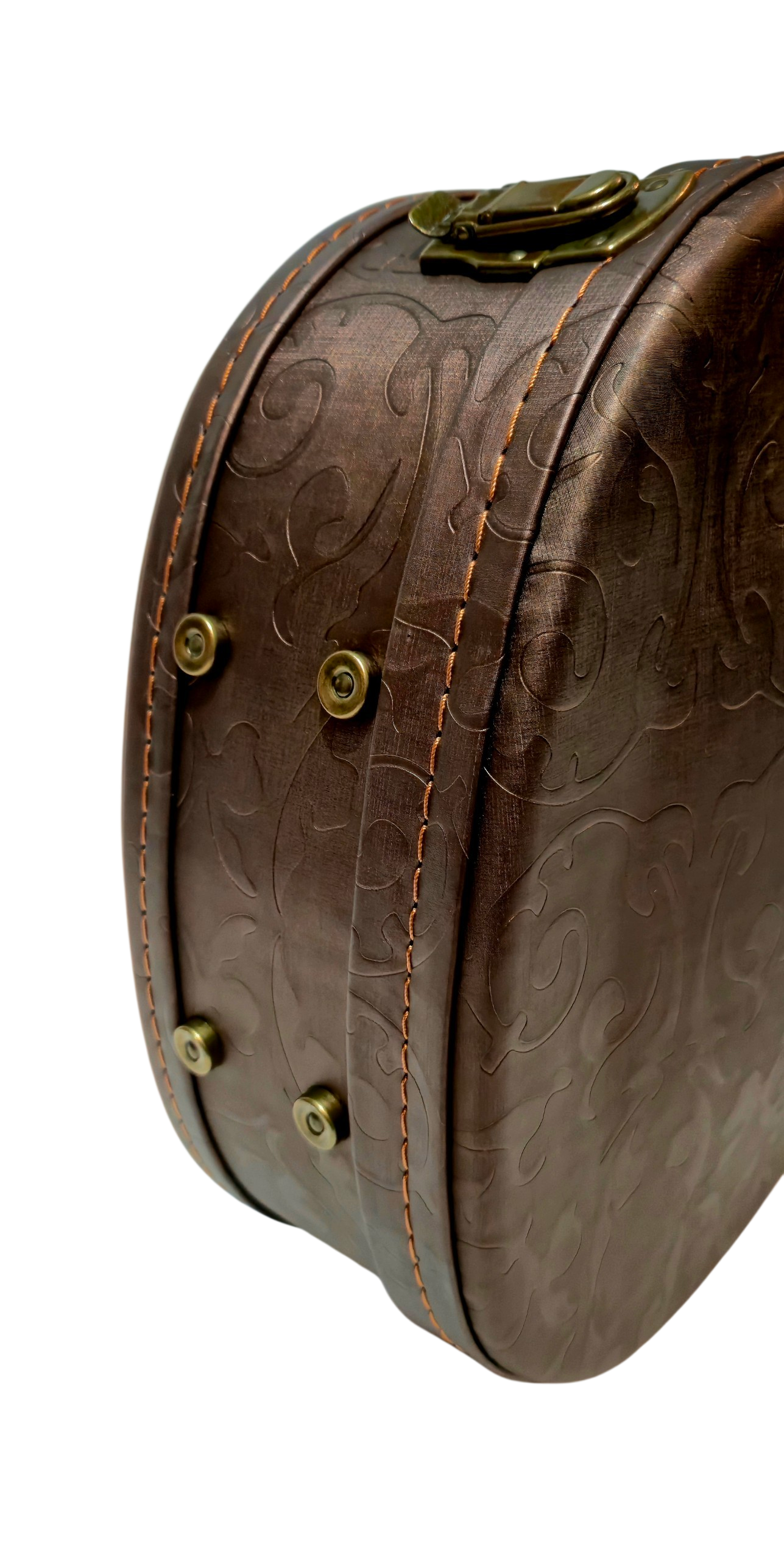 A close-up of a brown embossed leather or faux-leather case with decorative stitching, brass-tone hardware, and a curved top edge on a plain white background.